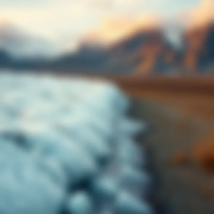 A melting glacier with dry land in the background, showing the impact of climate change.